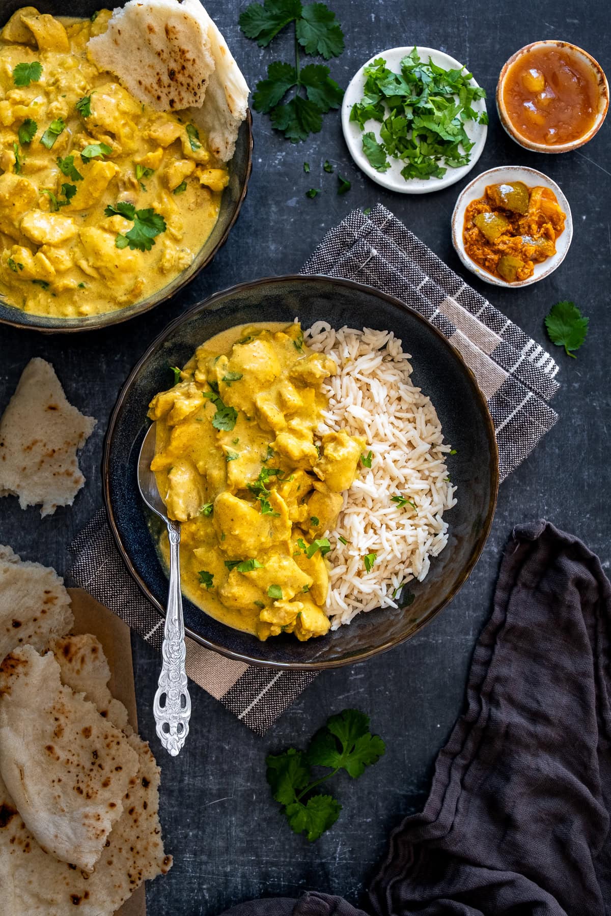 Overhead shot of Easy Chicken Korma in a bowl with basmati rice.