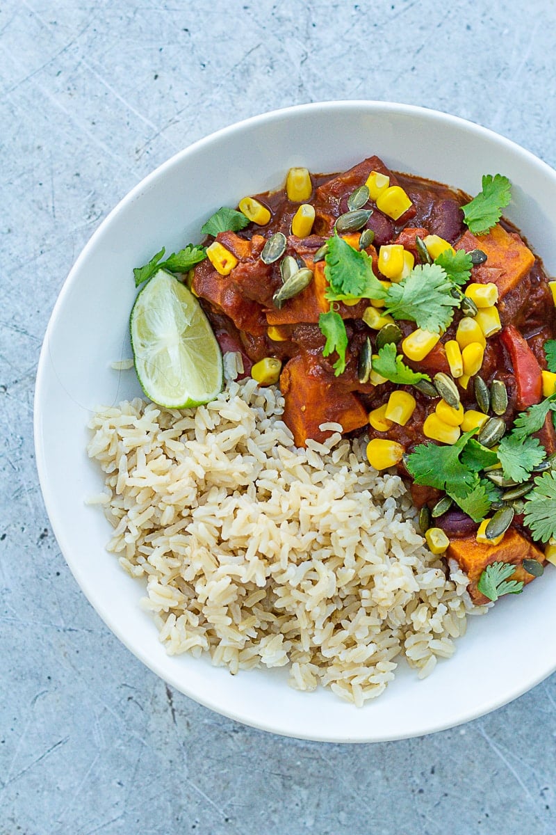 Overhead shot of Easy Vegetable Mole in a bowl with brown rice
