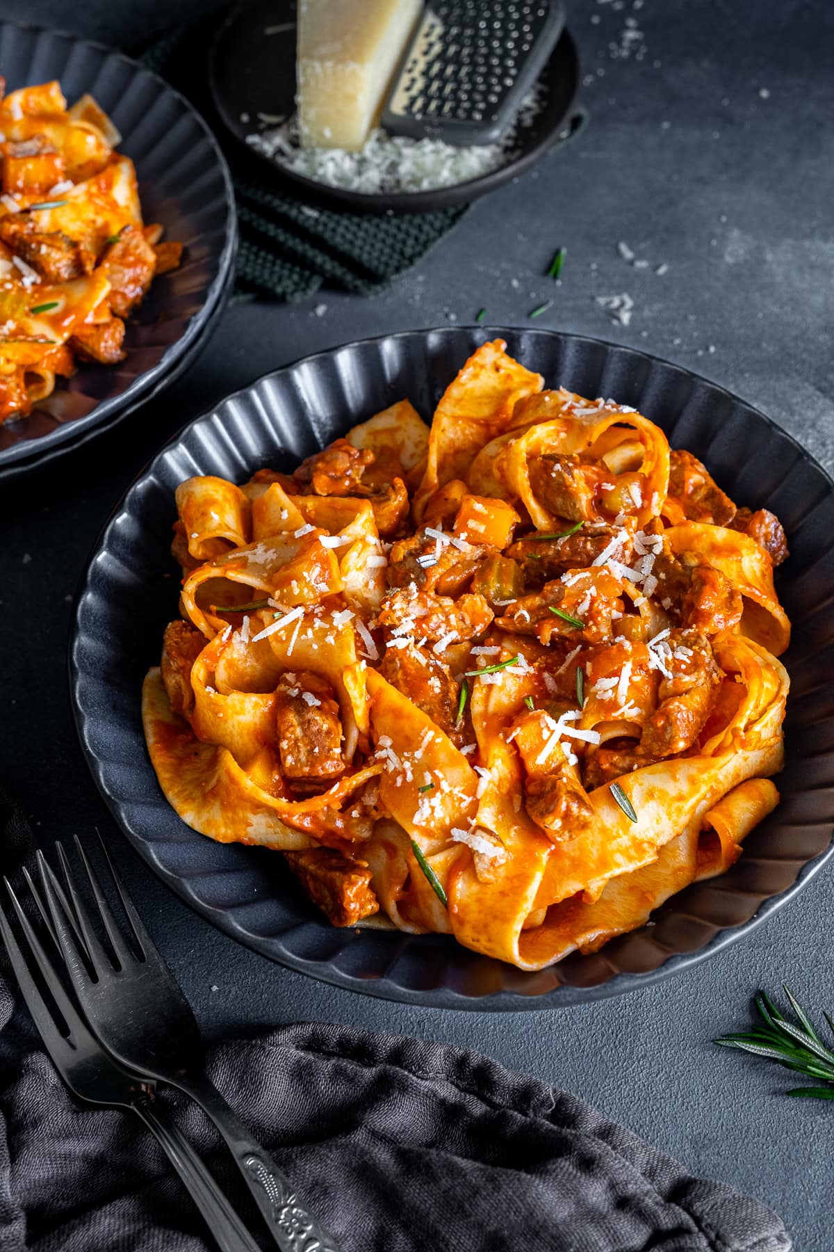 Leftover Lamb Ragu in a bowl with parmesan.