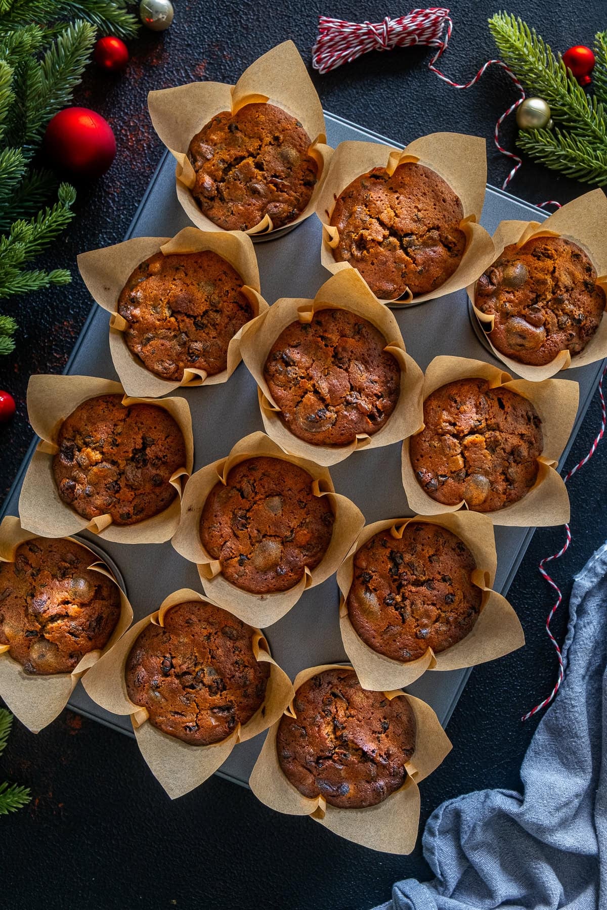 Overhead shot of Easy Christmas Cake Muffins in the muffin tray.