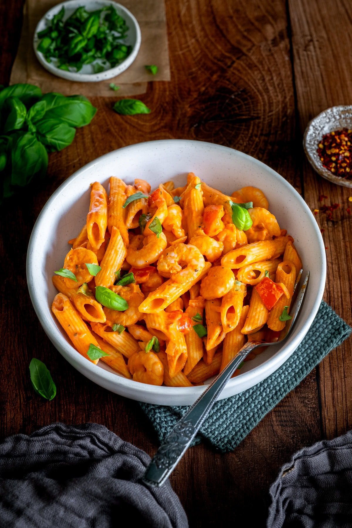 Closeup of 1 bowl of Creamy Prawn Tomato Pasta.