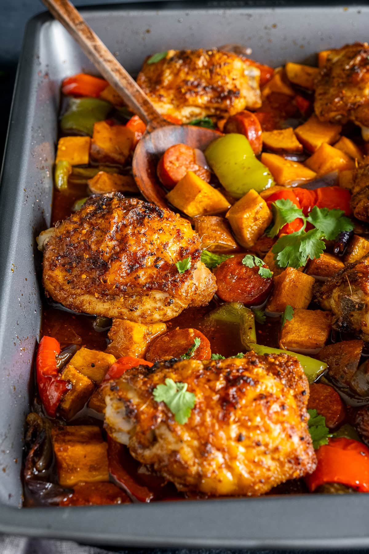 Closeup of Cajun Chicken Traybake in the tray.