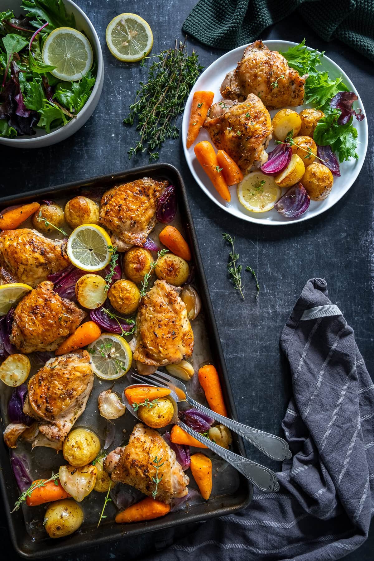 Overhead shot of Chicken and Potato Traybake on the tray and on a plate.