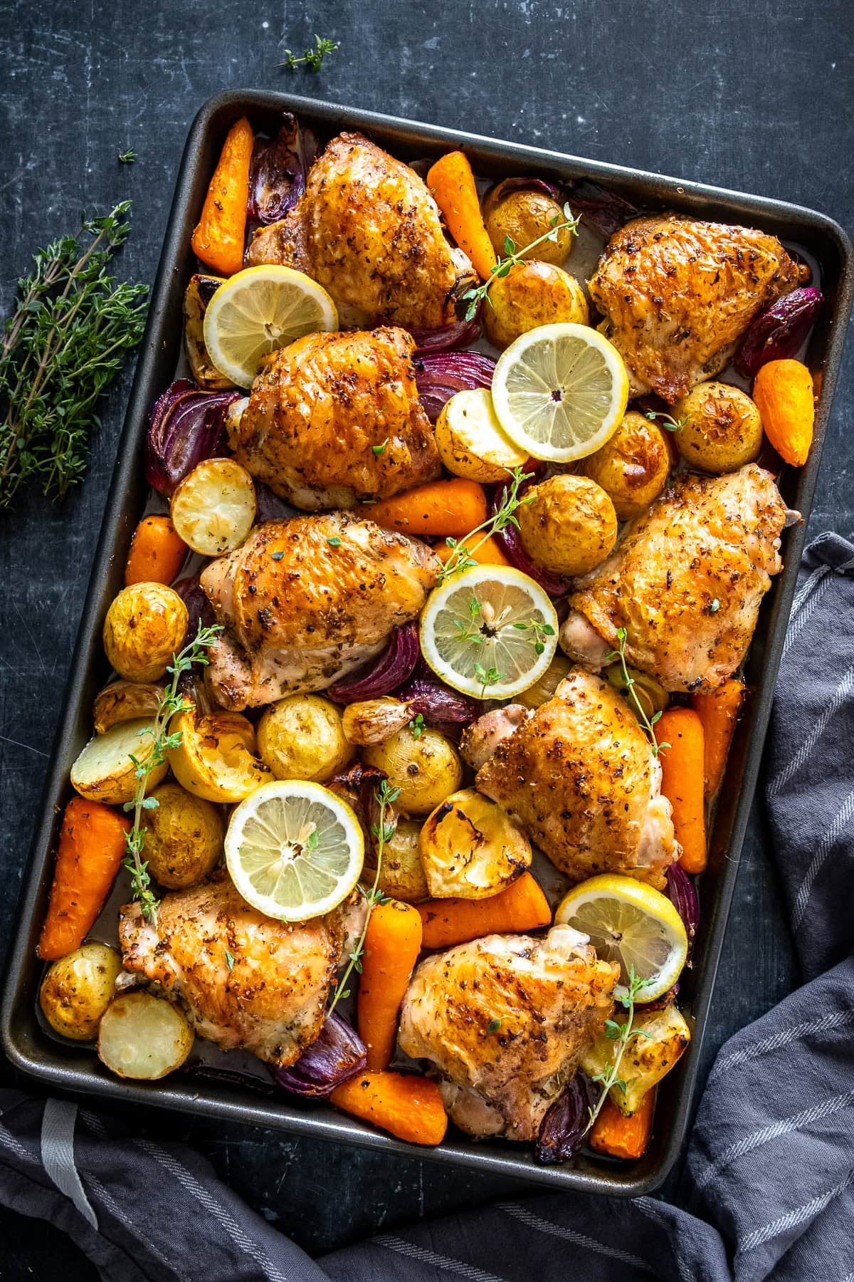 Overhead shot of Chicken and Potato Traybake on the tray.