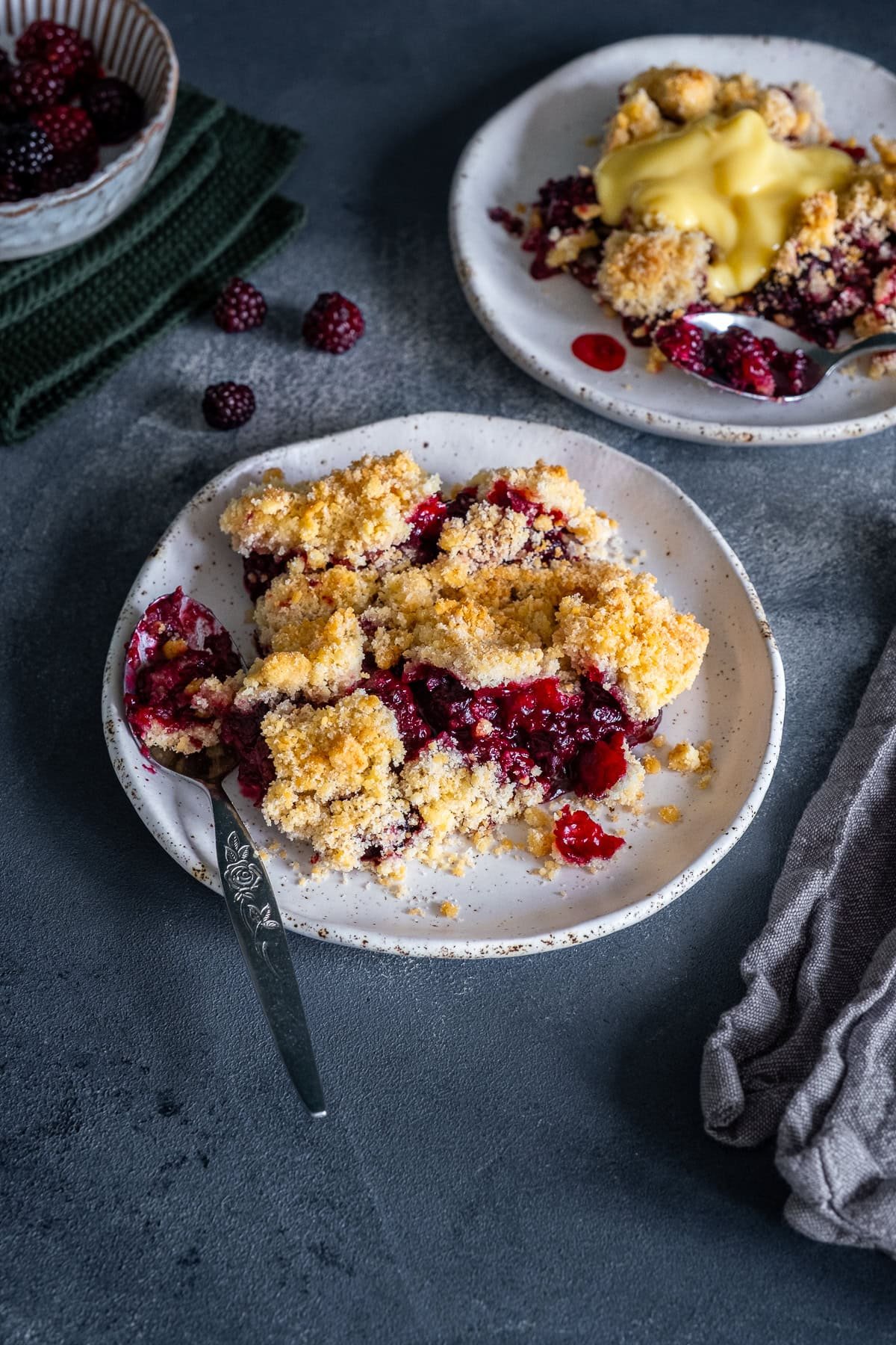 Closeup of 2 plates of Easy Blackberry Crumble