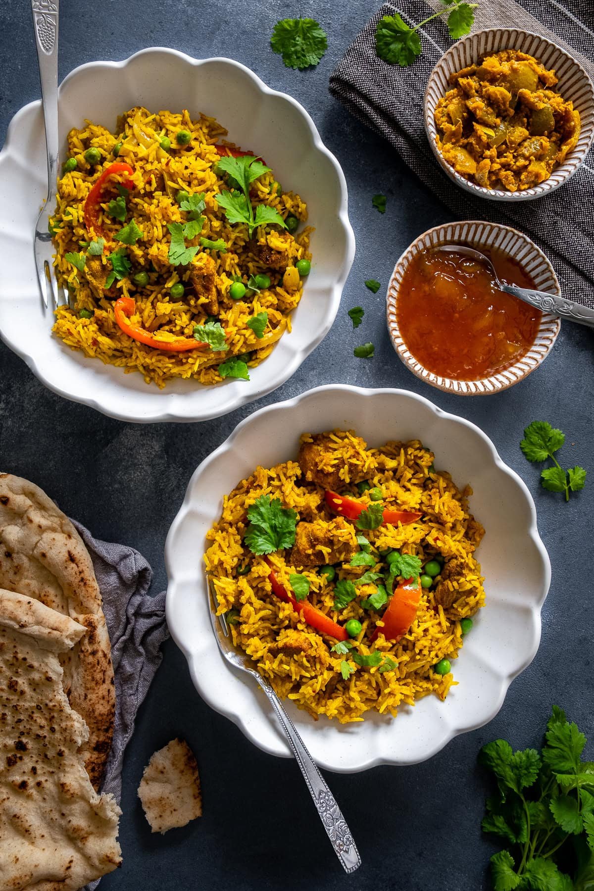 Overhead shot of 2 bowls of Easy Chicken Biryani.