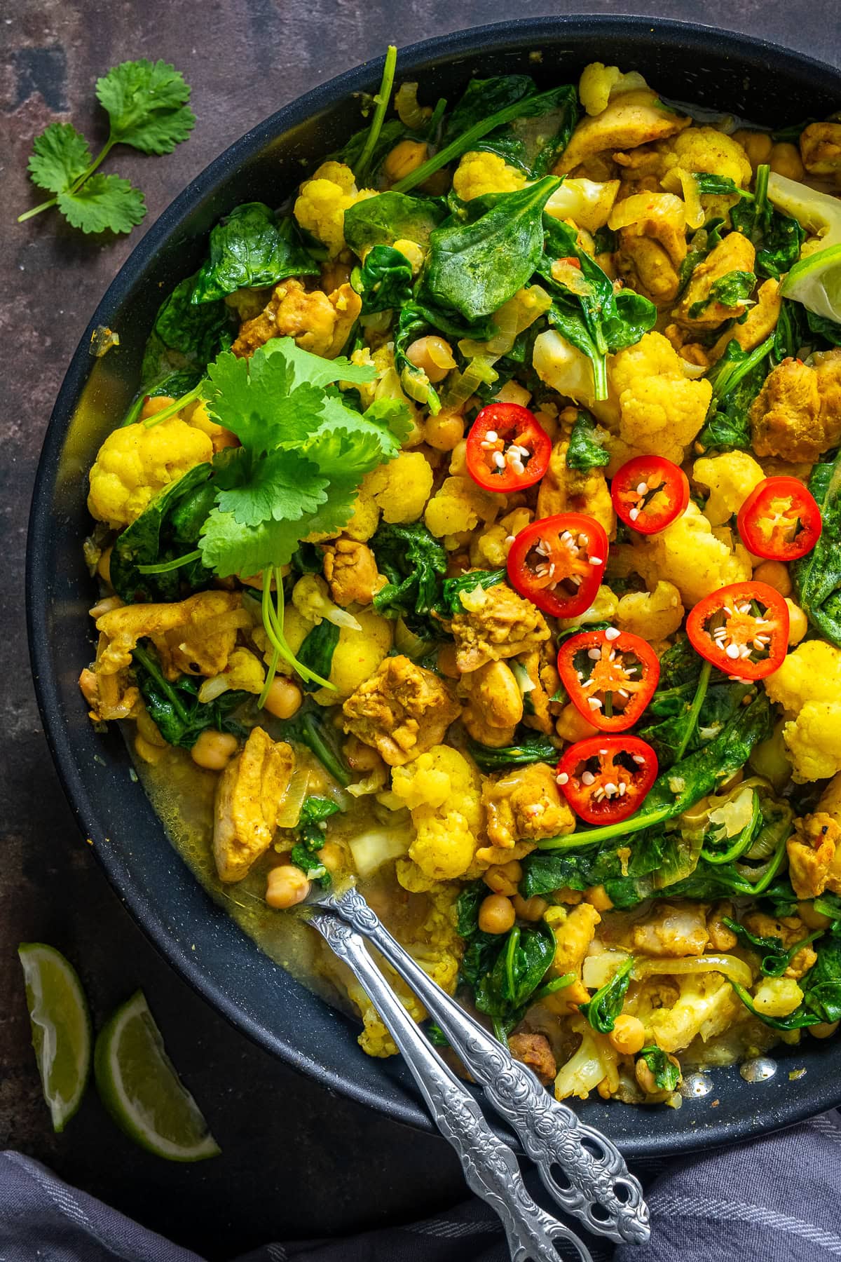 Closeup overhead shot of Chicken and Chickpea Curry with Spinach