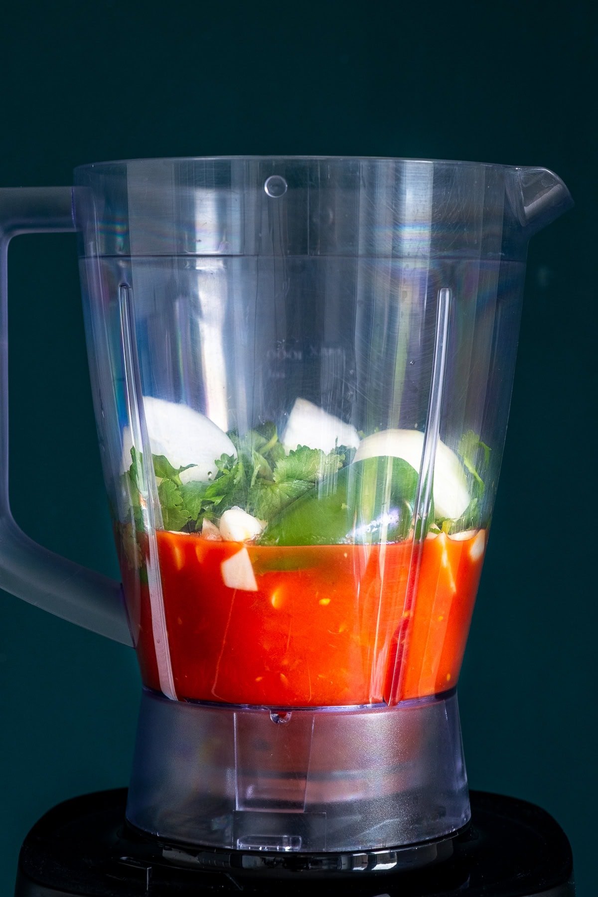 Ingredients for 5 Minute Blender Salsa in the blender jug.