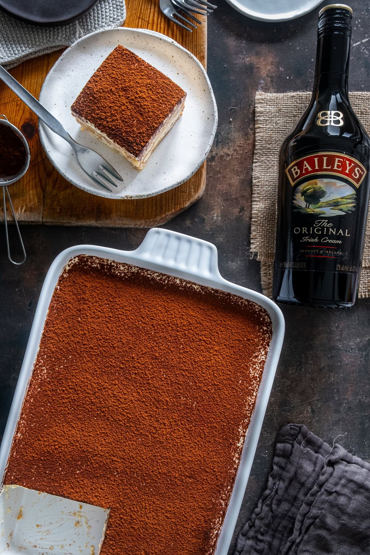 Overhead shot of Easy Baileys Tiramisu and a bottle of Baileys