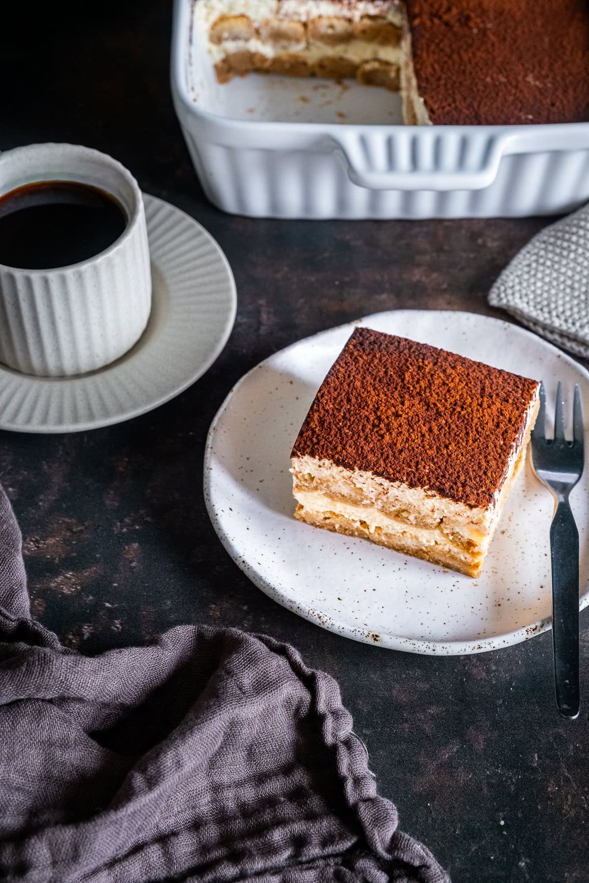 Once piece of Easy Baileys Tiramisù with a cup of coffee.