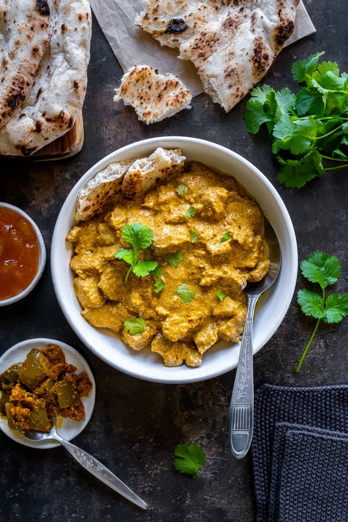 Overhead shot of Easy Beef Korma in a bowl with a spoon