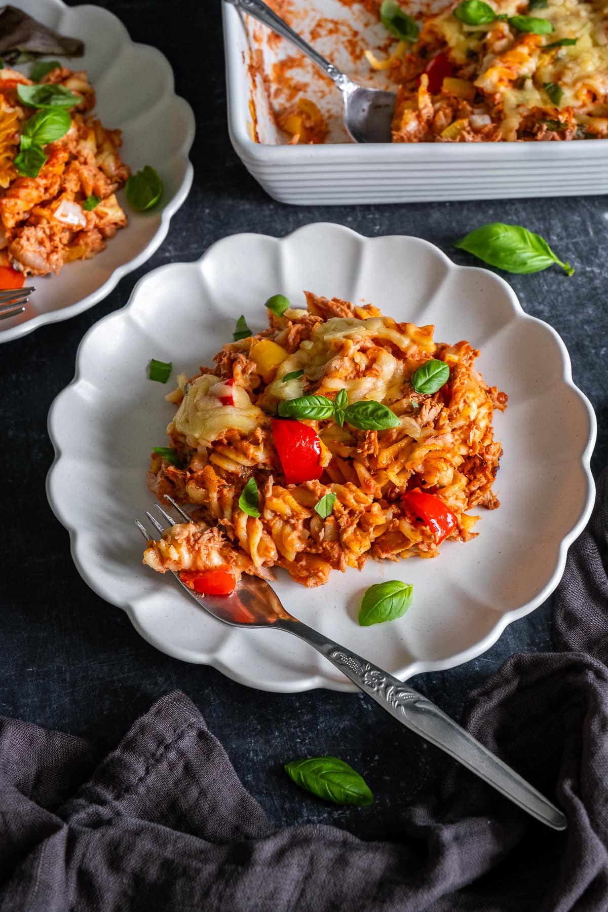 Closeup of 1 portion of Creamy Tomato Tuna Pasta Bake on a plate.
