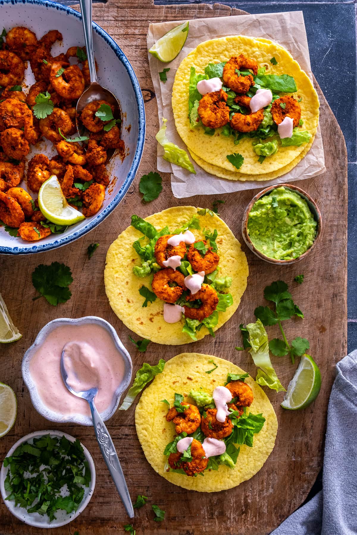 Overhead shot of 3 Easy Prawn Tacos on a board